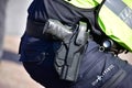 Police Officer`s gun on patrol in the Netherlands Royalty Free Stock Photo