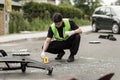 Police officer securing accident scene