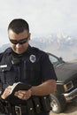 Police Officer Taking Notes Royalty Free Stock Photo