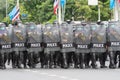 Police officer team with weapons and riot shield protection. Violence Against Demonstrators and protesters during COVID-19