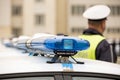 Police officers cars warning lightbars Royalty Free Stock Photo