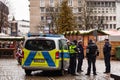 Police officers and van outside of christmas market in aachen germany