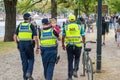 Lost little girl and police officers 1 Royalty Free Stock Photo