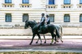 Police officers on horseback on Horse Guards Road, London