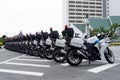 Police officers motorcycle line up on the road Royalty Free Stock Photo