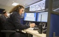 Policewoman at surveillance control center Royalty Free Stock Photo
