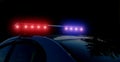 Police patrol on the street at night. Flashing red and blue police car lights in night time. Light alarm emergency flashing siren Royalty Free Stock Photo