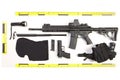 Police photo evidence of seized automatic gun and other weapons and contraband Royalty Free Stock Photo