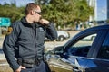 Police, radio and security with a man officer outdoor on patrol while talking to headquarters for a situation report Royalty Free Stock Photo