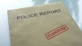 Police report classified, seal stamped on folder with important documents Royalty Free Stock Photo