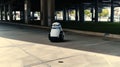 Police Robot Patrolling Parking Garage. AI Generated