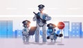 police robots patrol cops in uniform standing together artificial intelligence technology concept Royalty Free Stock Photo