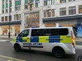 Police rushing to an incident scene on the streets of London, England