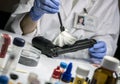 Police Scientific extracts traces of a gun in the laboratory of balistica