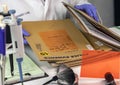 Police scientist searches for criminal file in crime lab