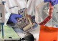 Police scientist takes out several bundles of dollar bills in crime lab