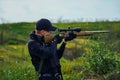 Police sniper aiming at the scope of his rifle Royalty Free Stock Photo