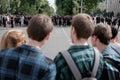 Police stand in a cordon at an unsanctioned opposition rally. Su