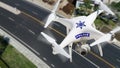 Police Unmanned Aircraft System, UAS Drone Flying Above A City Street Royalty Free Stock Photo