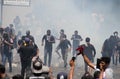 Police use tear gas to disperse protesters during an anti-government protest outside the PM's office in Colombo Sri Lanka