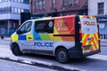 Police van decorated with LGBT plus rainbows, in Newcastle upon Tyne, UK.