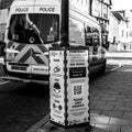 Police Van Parked Next To A Coronavirus Covid-19 Health Warning With No People