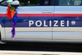 Police vehicle at a large demonstration in Vienna