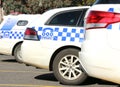 Police vehicles parked outside a police station