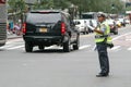 Police woman is directing traffic Royalty Free Stock Photo