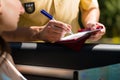 Police - woman in traffic violation getting ticket Royalty Free Stock Photo