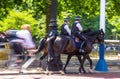 Police women on horseback on The Mall, street in front of Buckingham Palace in London Royalty Free Stock Photo