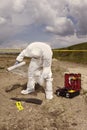 Police at work - human skull packing on plain construction yard during work