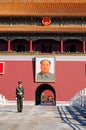 Policeman and Mao's portrait