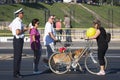 Policeman and pedestrians, bike and dog Royalty Free Stock Photo