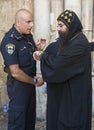 Policeman and priest Royalty Free Stock Photo