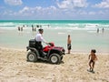 Policeman in quad-biking, the beaches of Miami patrol.