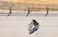 Policeman Riding Bike on the Boardwalk Royalty Free Stock Photo