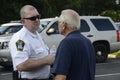 Policeman talking to a senior citizen