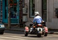 Policeman three-wheeled motorcycle Royalty Free Stock Photo