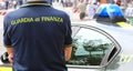 Policeman with uniform and text GUARDIA DI FINANZA