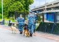 Policemen and dogs patrol the park near the Exhibition of Achievements of the National Economy. Cynologists at VDNKh.