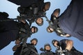 Policemen With Guns Standing Against Sky