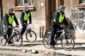 Policemen police on bicycles city