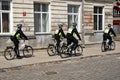 Policemen police on bicycles city