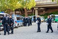 Policemen and policewomen in an action in front of the Cologne exhibition grounds.