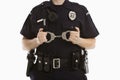 Policewoman with handcuffs. Royalty Free Stock Photo