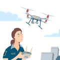 Policewoman operating drone with remote controller Royalty Free Stock Photo