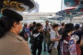 Policewoman standguard security for protest at Pathumwan Intersection