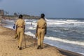 Policewomen at the beach in India Royalty Free Stock Photo