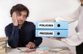 Policies and Procedure - two binders in the hands of women Royalty Free Stock Photo